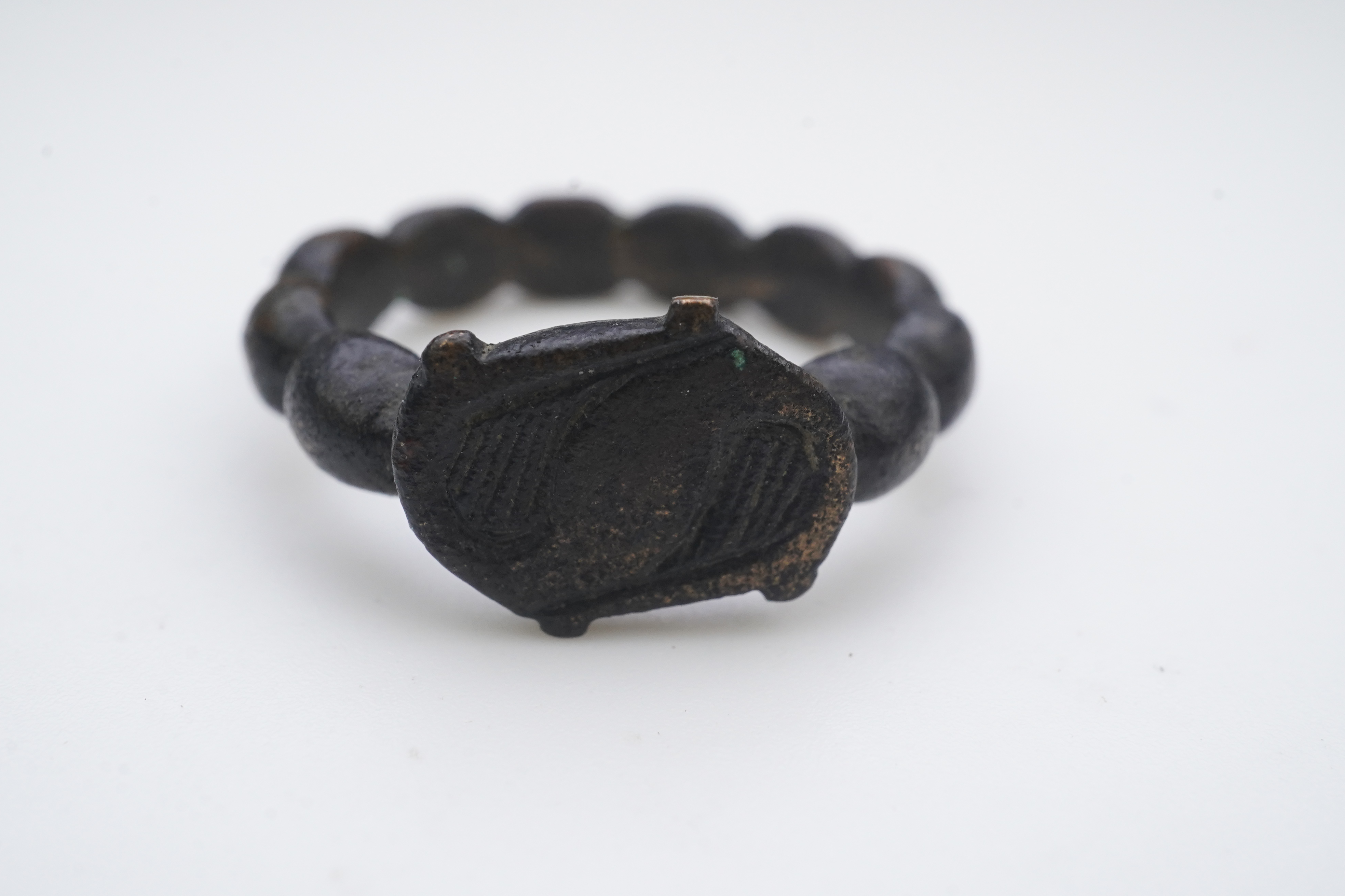 A Tudor bronze 'decade' ring, England, circa 1500